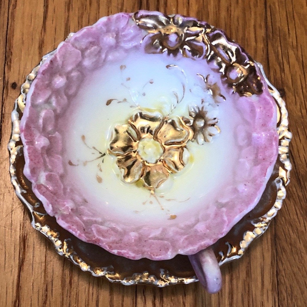 Teacup with Flowers Sculptured Around Rim